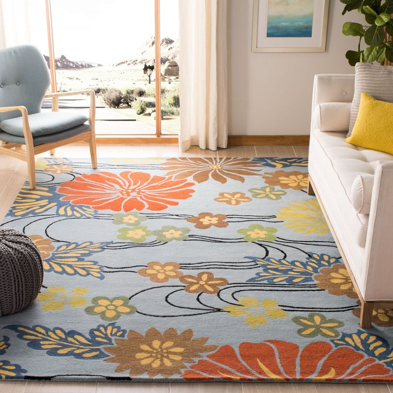 Soho SOH738 Hand Tufted Area Rug - Blue/Multi - 8'3"x11' - Safavieh.