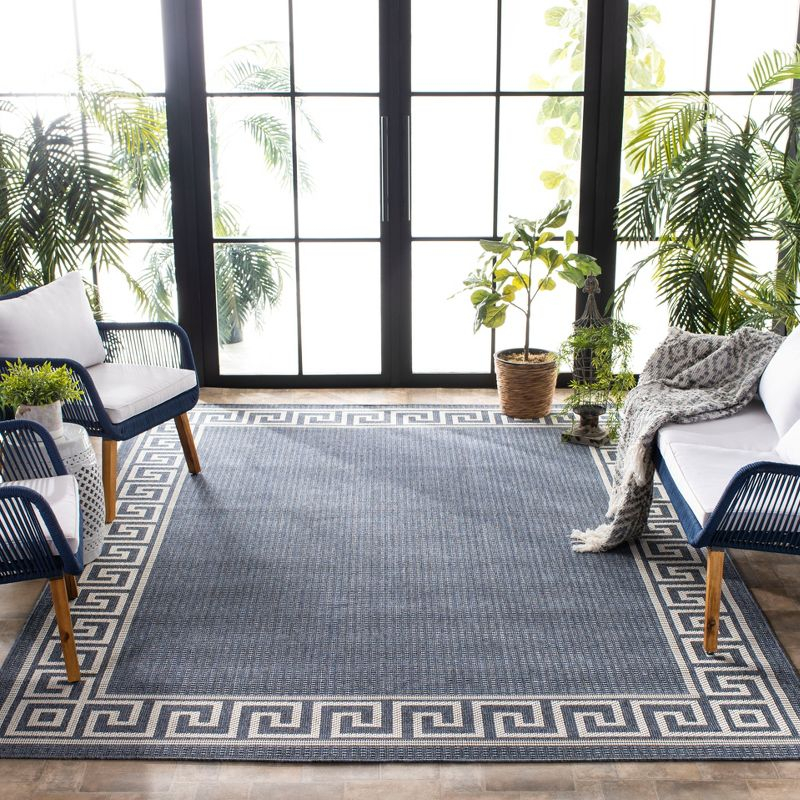 Bermuda BMU820 Power Loomed Indoor/Outdoor Area Rug - Dark Blue/Ivory - 8'9"x11'9" - Safavieh.
