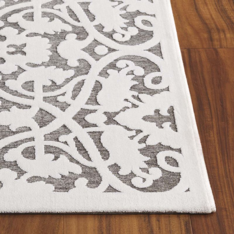 Paradise PARB636 Machine Made Indoor Area Rug - Ivory/Dark Grey - 5'x7'5" - Safavieh