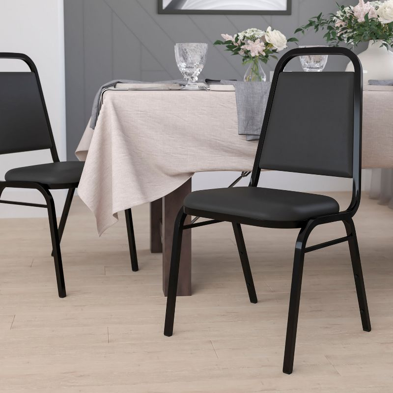Emma and Oliver Trapezoidal Back Banquet Chair, Black Vinyl/Black Frame