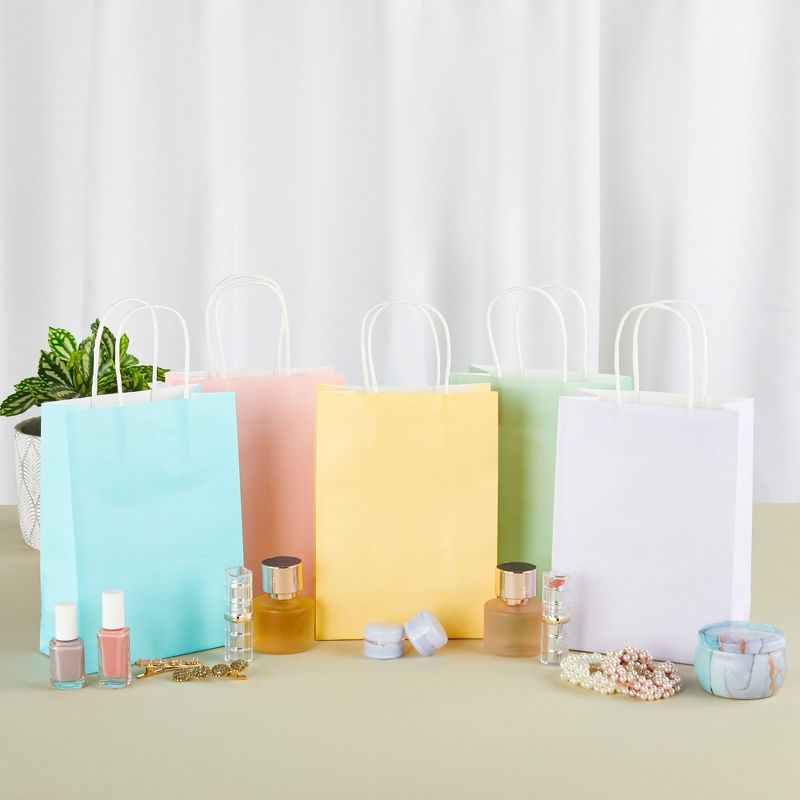 Juvale 25 Pack Pastel Gift Bags with Handles, Paper Party Favor Bags, for Goodies, Birthdays, 5 Colors - 6.3x3.2x8.7 inch