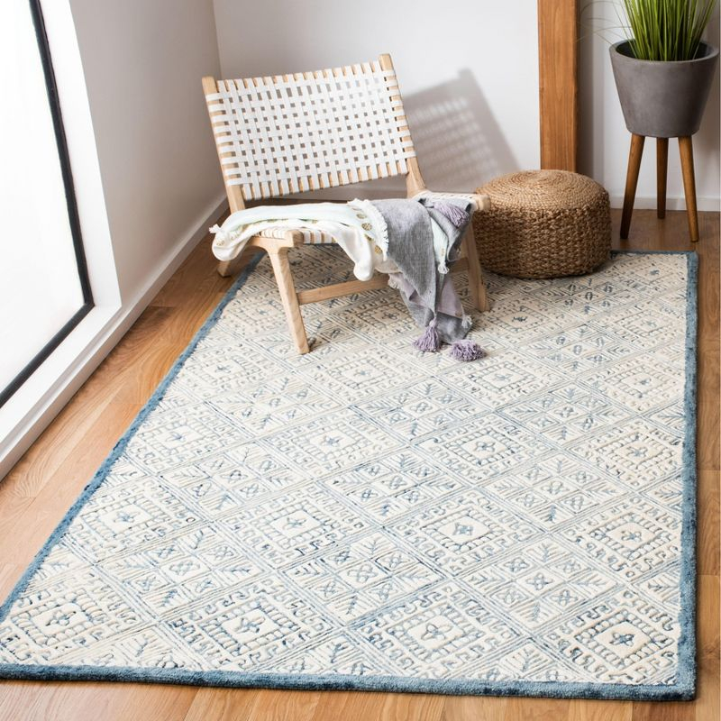 Glamour GLM660 Hand Tufted Indoor Area Rug - Blue/Ivory - 4'x6' - Safavieh