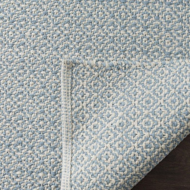 Montauk MTK717 Hand Woven Indoor Accent Rug - Ivory/Light Blue - 2'6"x4' - Safavieh.