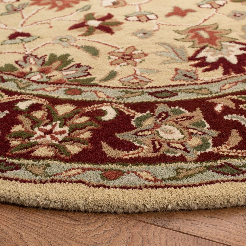 Heritage HG965 Hand Tufted Area Rug - Ivory/Red - 6' Round - Safavieh.