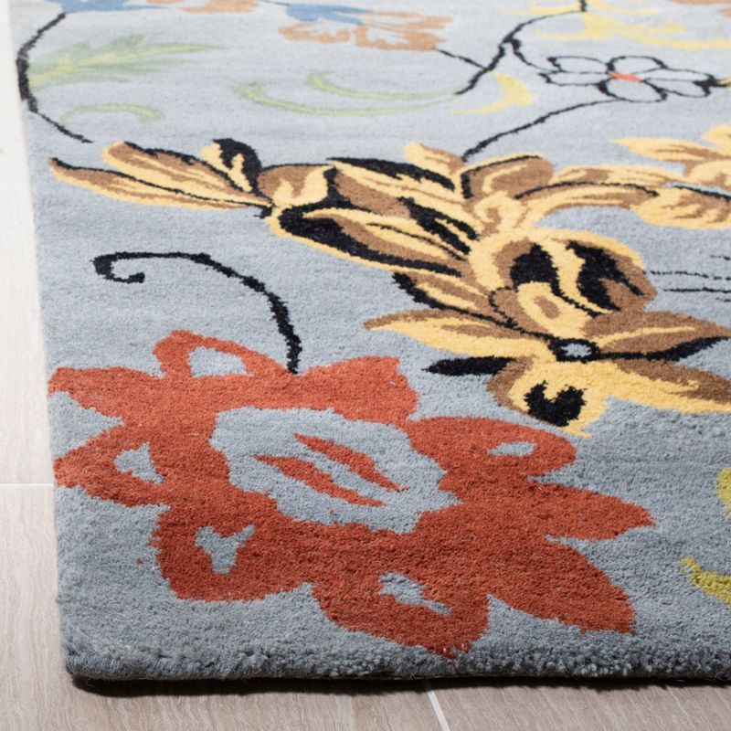 Soho SOH736 Hand Tufted Rectangle Contemporary Area Rug - Blue - 5' X 8' - Safavieh.