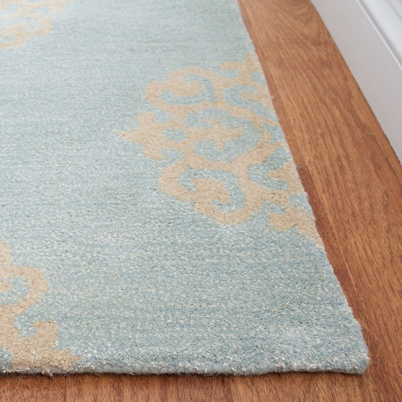 Soho SOH724 Hand Tufted Indoor Area Rug - Turquoise/Yellow - 6'x9' - Safavieh