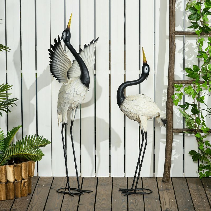 Outsunny Heron Garden Statues, 35.5" & 40.5" Standing Bird Sculptures, Metal Yard Art Decor, Landscape Decoration Set of 2, White & Black