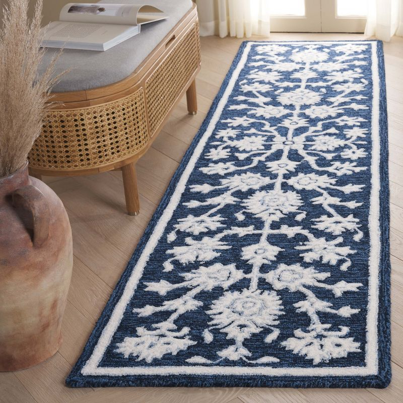 Ebony EBN134 Handmade Tufted Runner Rug - Navy/Ivory - 2'-3" X 9' - Safavieh