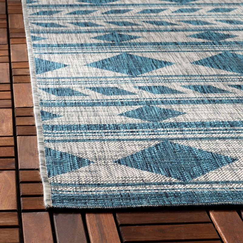 Courtyard CY8529 Power Loomed Indoor/Outdoor Area Rug - Grey/Teal - 6'7"x9'6" - Safavieh.