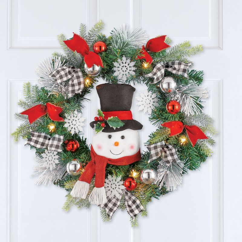 Collections Etc LED Lighted Winter Snowman Wreath with Black/White Buffalo Check Bows Green