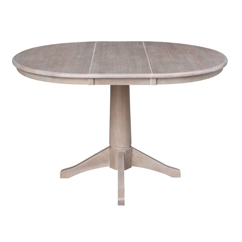 36" Magnolia Round Top Dining Table with 12" Leaf Washed Gray Taupe - International Concepts: Hardwood Pedestal Base, Seats 4