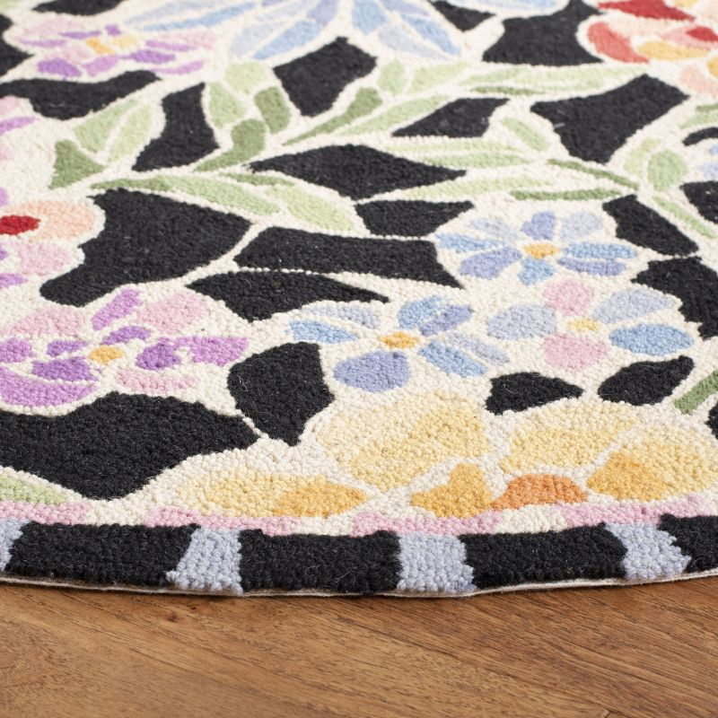 Chelsea HK214 Handmade Area Rug - 3'9"x5'9" - Black - Safavieh