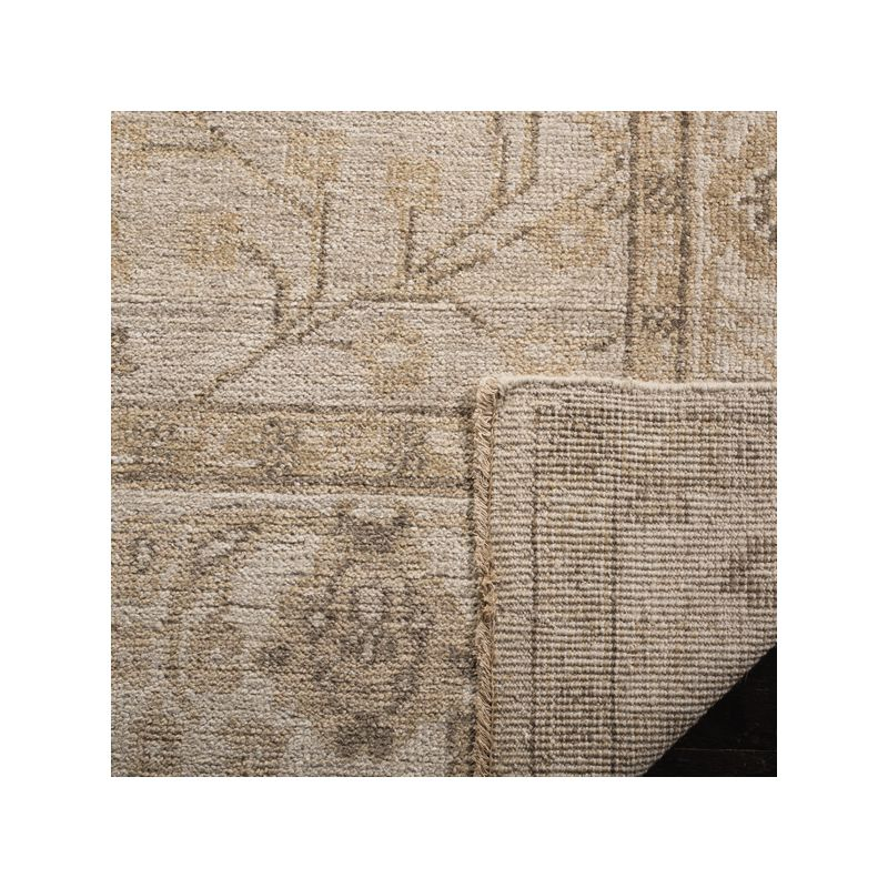 Izmir IZM134 Hand Knotted Area Rug - Gold/Ivory - 9'x12' - Safavieh