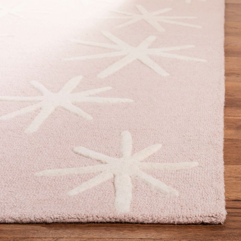Safavieh Kids SFK908 Hand Tufted Area Rug - Pink/Ivory - 3'x5' - Safavieh.