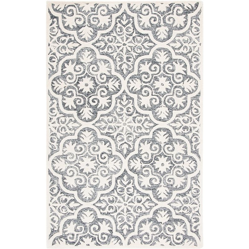 Metro MET859 Hand Tufted Indoor Area Rug - Black/Ivory - 8'x10' - Safavieh