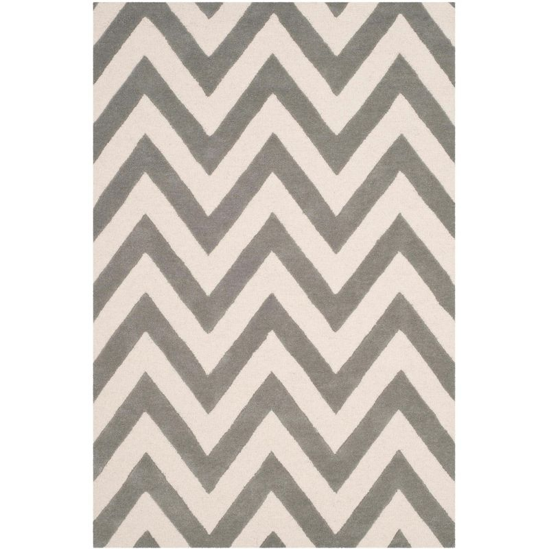 Safavieh Kids Basic Chevron SFK921 Hand Tufted Indoor Accent Rug - Grey/Ivory - 4'x6' - Safavieh