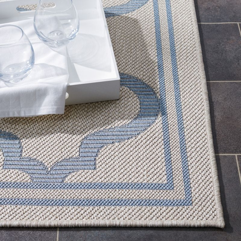 Bermuda BMU810 Power Loomed Indoor/Outdoor Machine Washable Area Rug - Ivory/Blue - 6'7"x9'2" - Safavieh