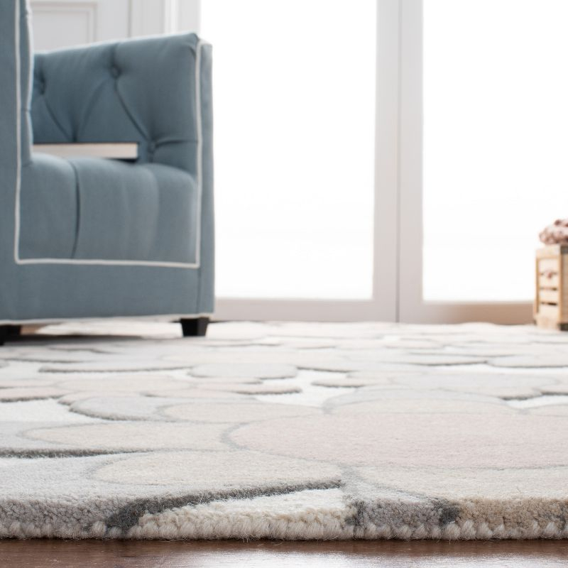 Safavieh Kids SFK923 Hand Tufted Area Rug - Ivory/Pink - 3'x5' - Safavieh.