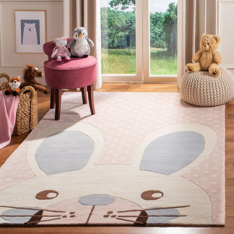 Safavieh Kids SFK922 Hand Tufted Area Rug - Pink/Ivory - 8'x10' - Safavieh.