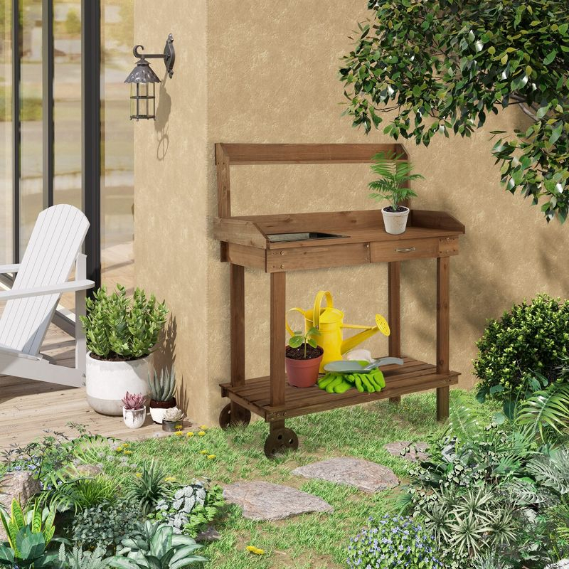 Outsunny 36'' Wooden Potting Bench Work Table with 2 Removable Wheels, Sink, Drawer & Large Storage Spaces, Brown