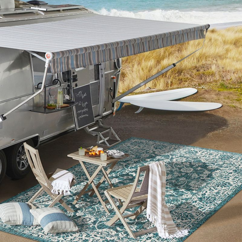 5'x8' Tela Bohemian Textured Weave Floral Indoor/Outdoor Area Rug, Teal/Gray - JONATHAN Y