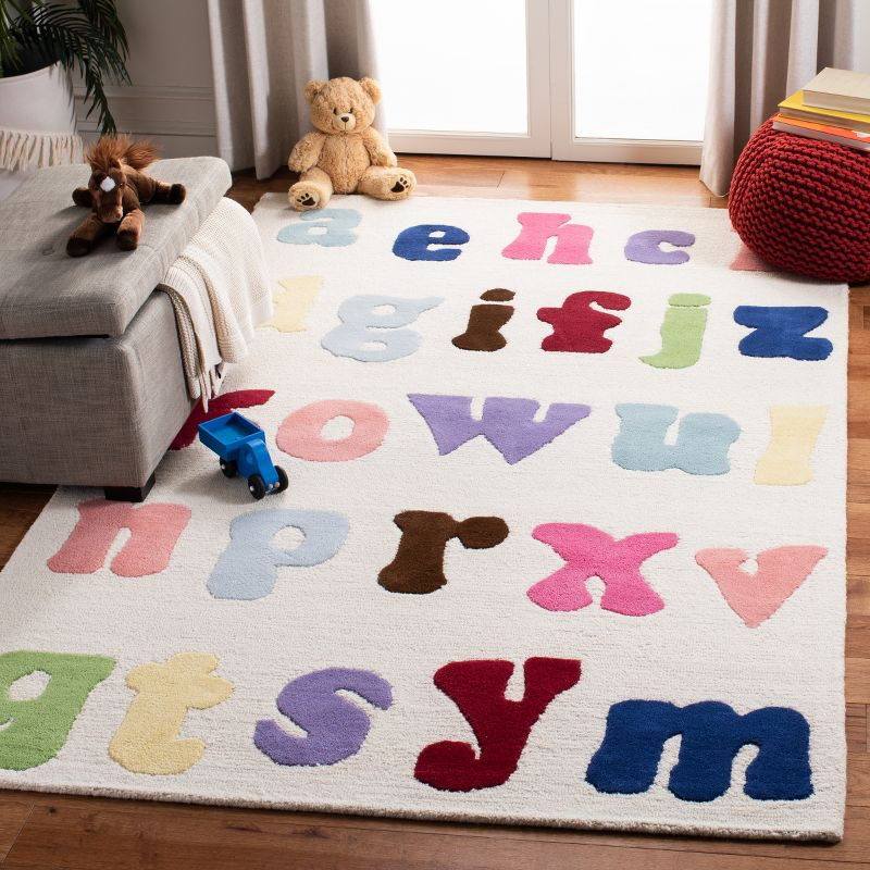 Safavieh Kids SFK389 Hand Tufted Indoor Area Rug - Ivory/Multi - 5'x8' - Safavieh
