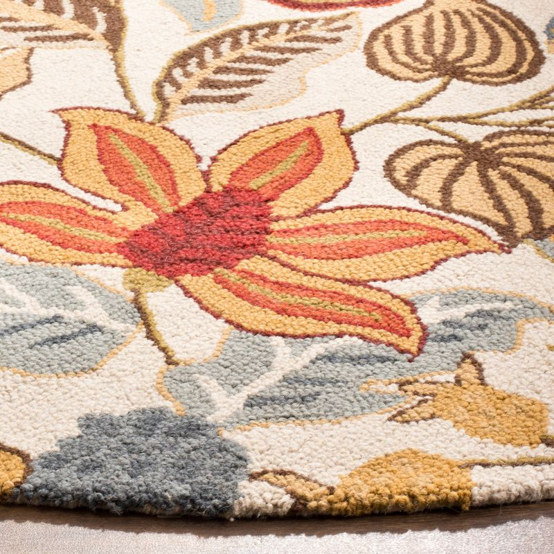 Blossom BLM863 Hand Hooked Area Rug - Ivory/Multi - 6' Round - Safavieh.