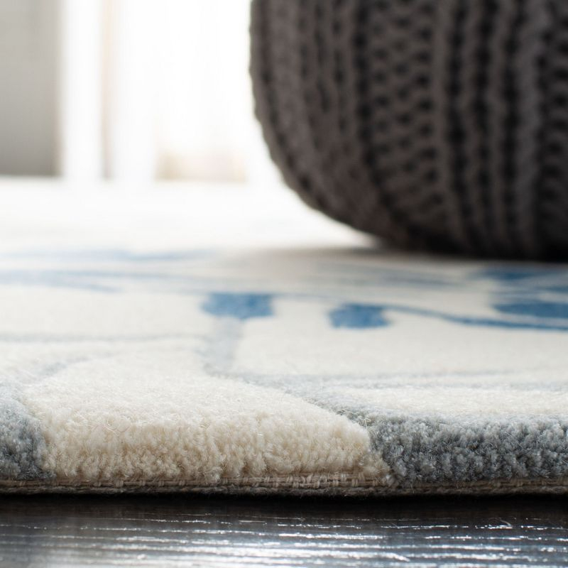 Capri CPR345 Hand Tufted Runner Rug - Ivory/Blue - 2'3"x9' - Safavieh.