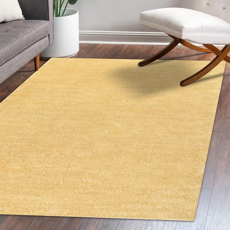 8'x10' Haze Solid Low-Pile Area Rug, Mustard - JONATHAN Y