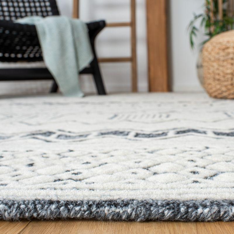 Roslyn ROS802 Hand Tufted Area Rug - Black/Ivory - 8'9"x11'9" - Safavieh.