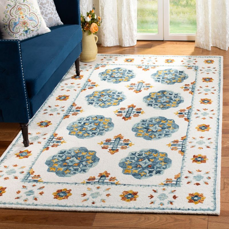 Blossom BLM901 Hand Tufted Area Rug - Blue/Ivory - 5'x8' - Safavieh.