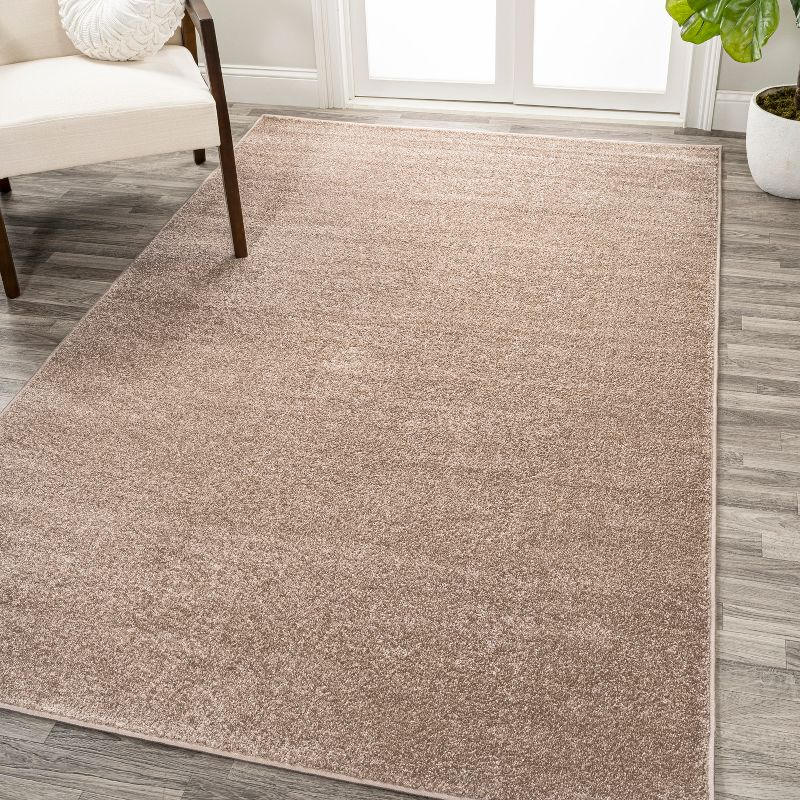 8'x10' Haze Solid Low-Pile Area Rug, Beige - JONATHAN Y