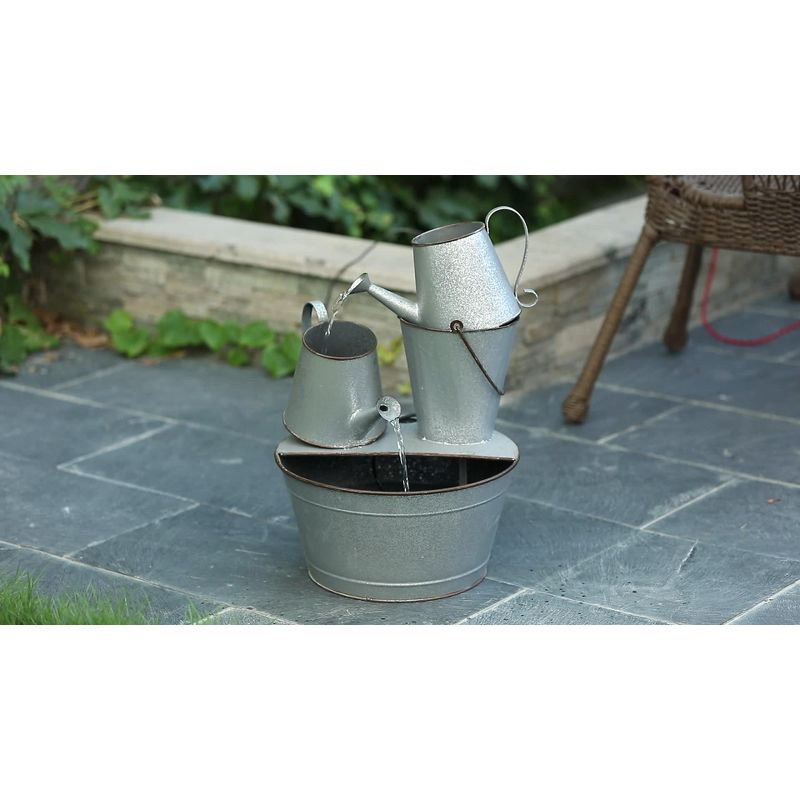 LuxenHome Farmhouse Rustic Metal Pitcher Outdoor Fountain Silver