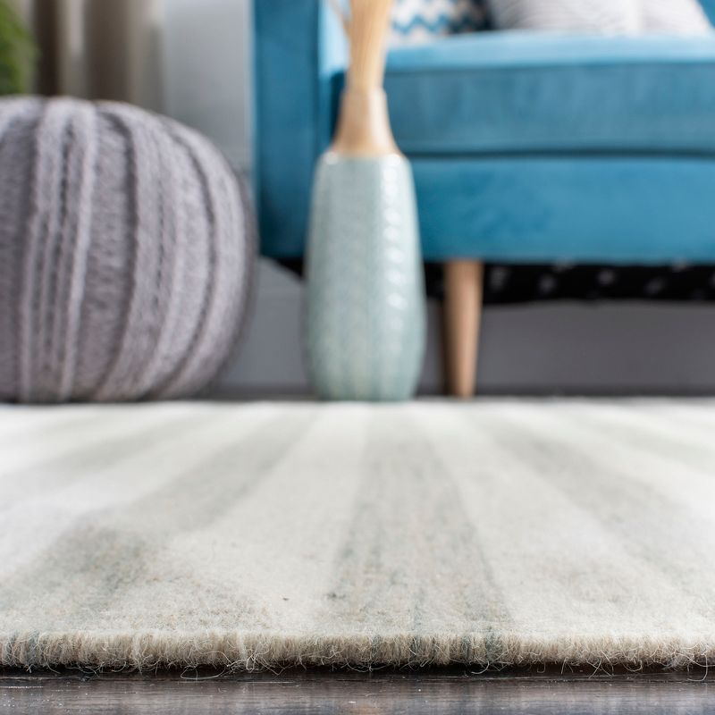 Dhurries DHU575 Hand Woven Flat Weave Area Rug Light Blue / Ivory 8' X 10' - Safavieh.