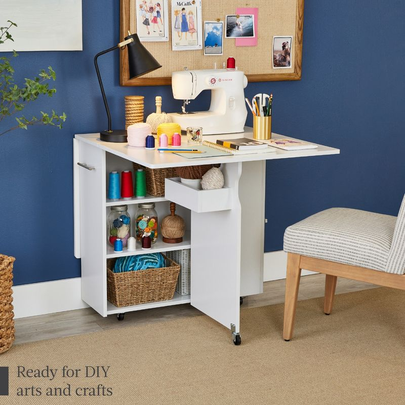Best Choice Products Multipurpose Folding Table w/ Wheels, 3 Storage Shelves, Cubby, Handle - White