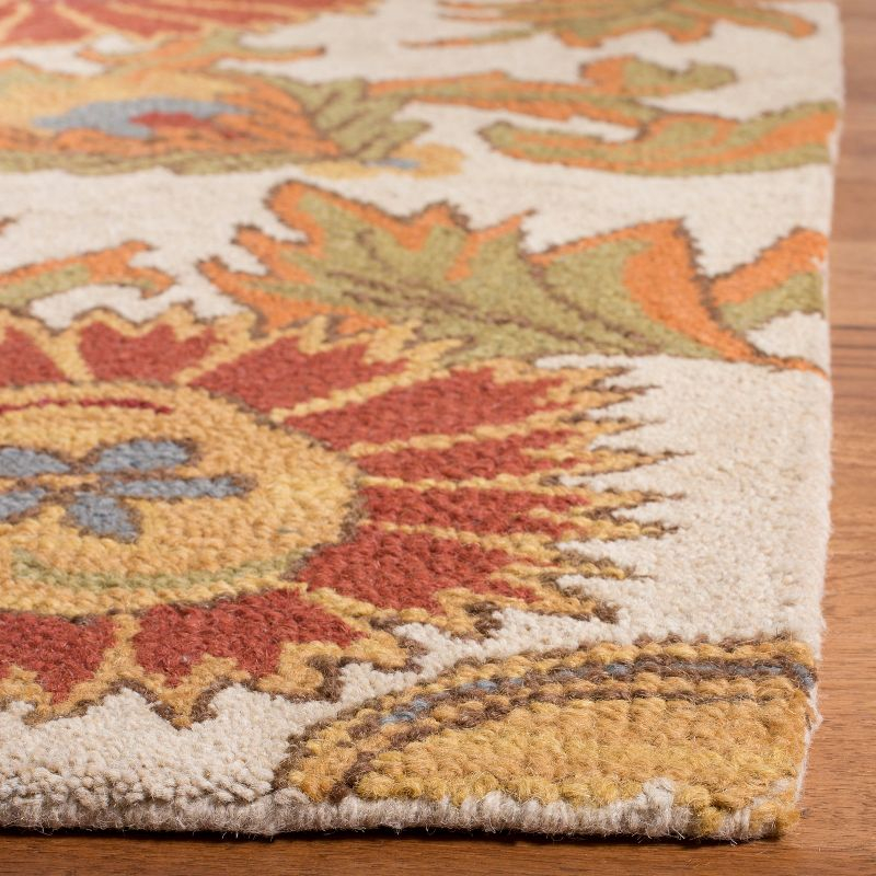 Blossom BLM912 Hand Hooked Area Rug - Ivory/Multi - 5'x8' - Safavieh.