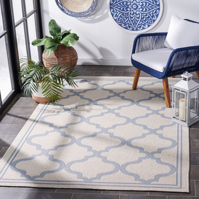 Bermuda BMU810 Power Loomed Indoor/Outdoor Machine Washable Area Rug - Ivory/Blue - 6'7"x9'2" - Safavieh