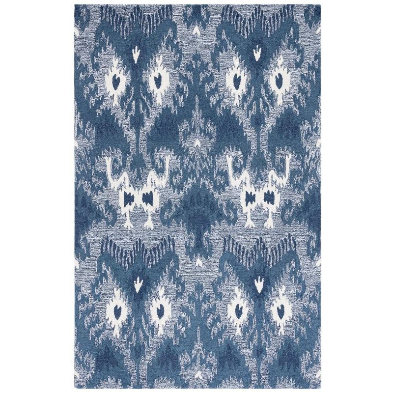 Ikat IKT652 Hand Tufted Area Rug - Blue/Ivory - 8'x10' - Safavieh.