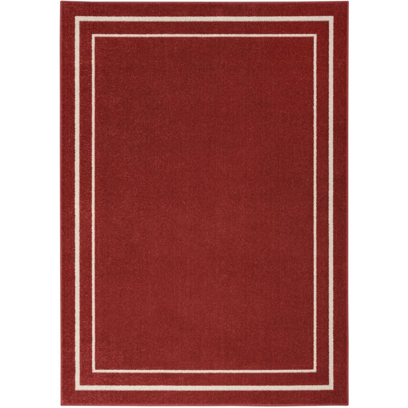 Nourison Essentials Solid Bordered Low Pile Indoor Outdoor Area Rug 5' x 7' Brick/Ivory