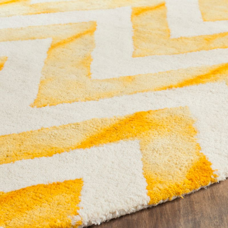 Dip Dye DDY715 Hand Tufted Area Rug - Ivory/Gold - 7' round - Safavieh.