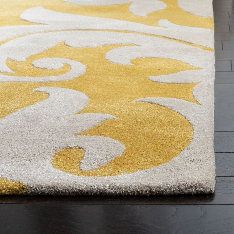 Soho SOH841 Hand Tufted Indoor Area Rug - Gold/Ivory - 5'x8' - Safavieh.