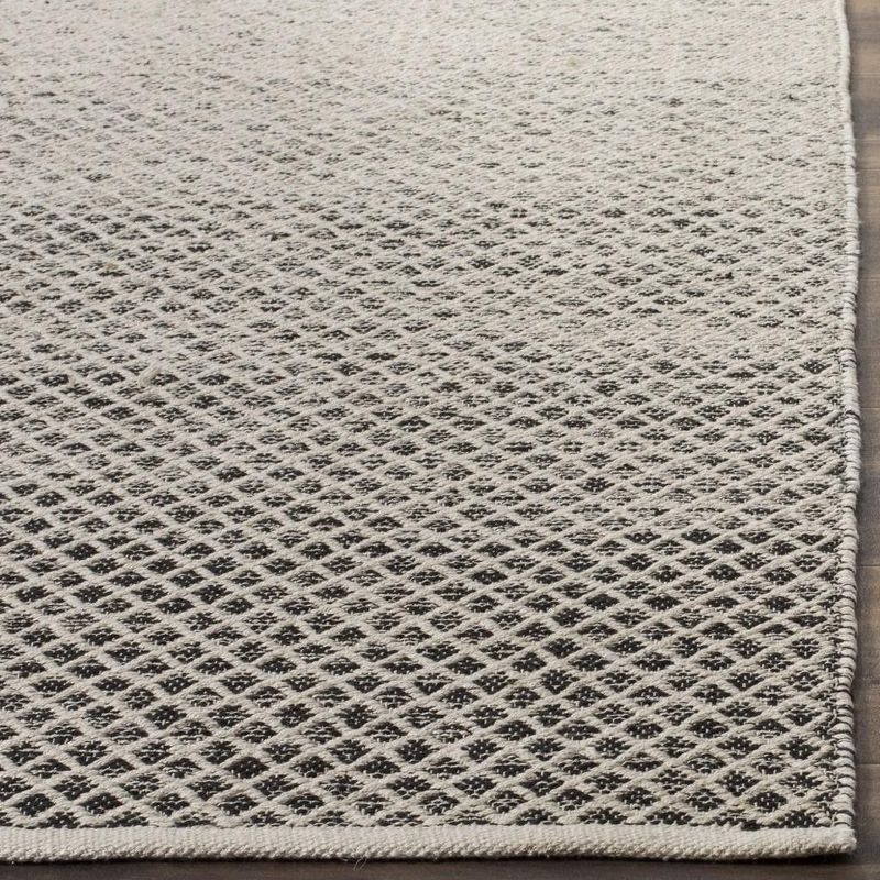 Montauk MTK601 Hand Woven Indoor Area Rug - Black/Ivory - 6'x9' - Safavieh.