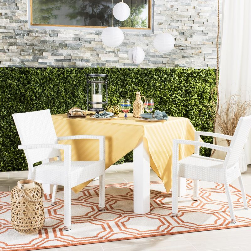 Kelda Stackable Arm Chair Indoor/Outdoor (Set Of 2) - PAT4004 - White - Safavieh