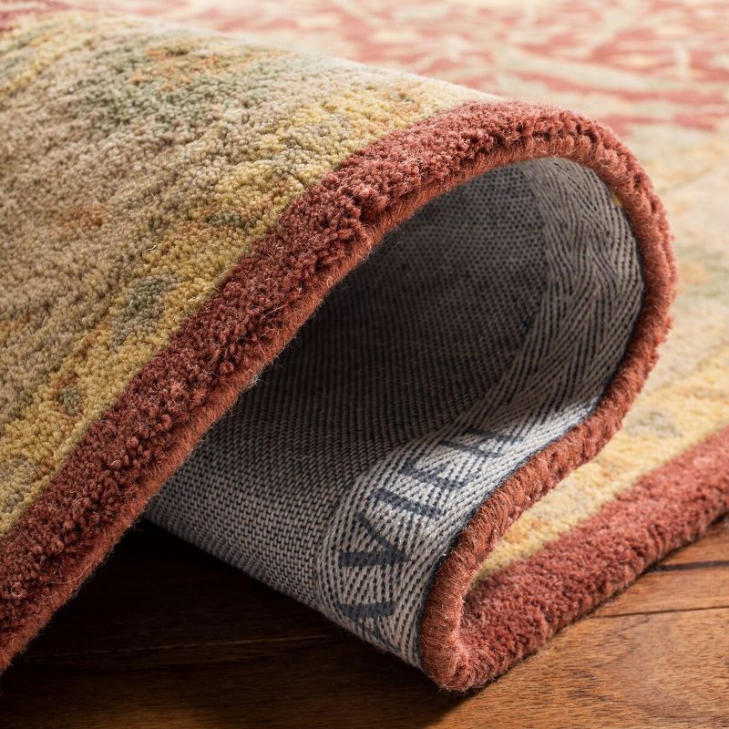 Antiquity AT14 Hand Tufted Indoor Area Rug - Rust - 7'6"x9'6" Oval - Safavieh