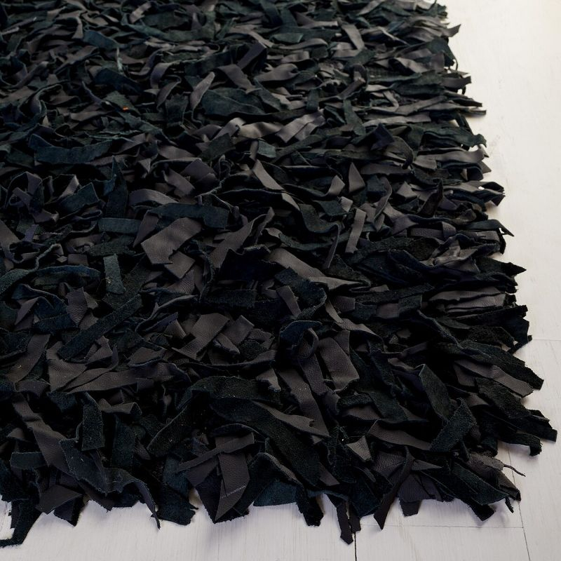Leather Shag LSG601 Hand Knotted Area Rug - Black - 8'x10' - Safavieh.