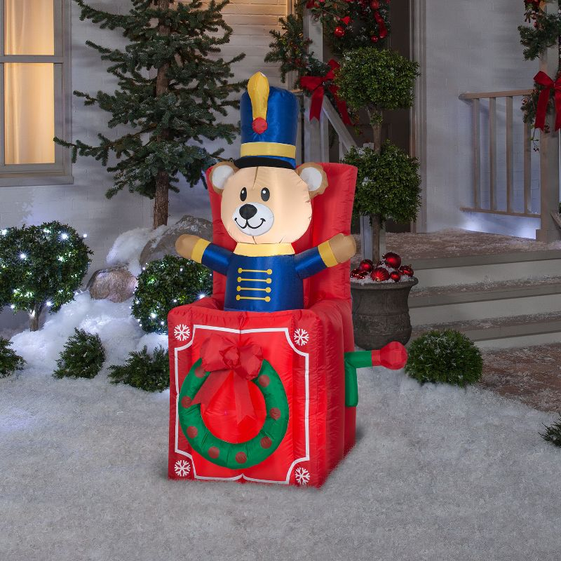 Gemmy Animated Christmas Airblown Inflatable Bear Pop Up, 5 ft Tall, Multicolored