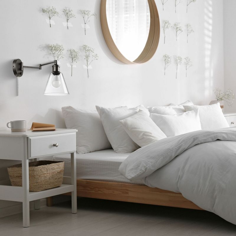 Globe Electric 10 Watt LED Plug In Wall Sconce Clear Glass Shade with 6 Foot Cord, Rotary On Off Switch on Canopy, and Hardware Kit, Dark Bronze