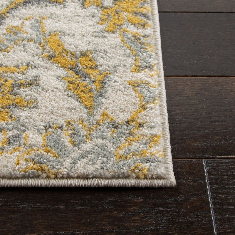 Evoke EVK238 Power Loomed Area Rug - Ivory/Gold - 6'7"x9' - Safavieh.