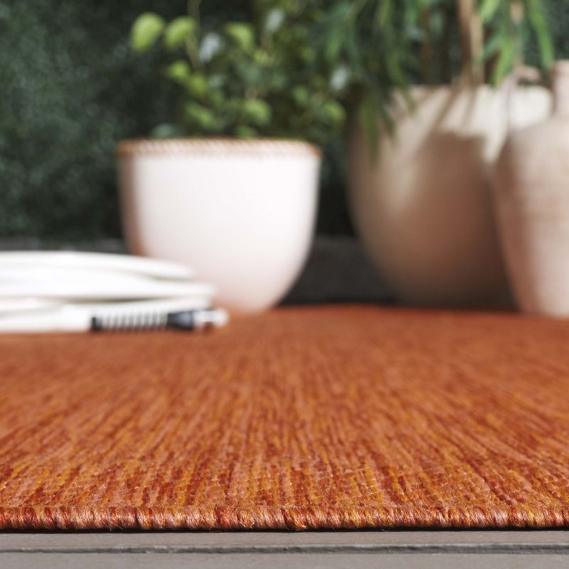 Beach House BHS274 Machine Made Loomed Area Rug - Orange - 9' X 12' - Safavieh