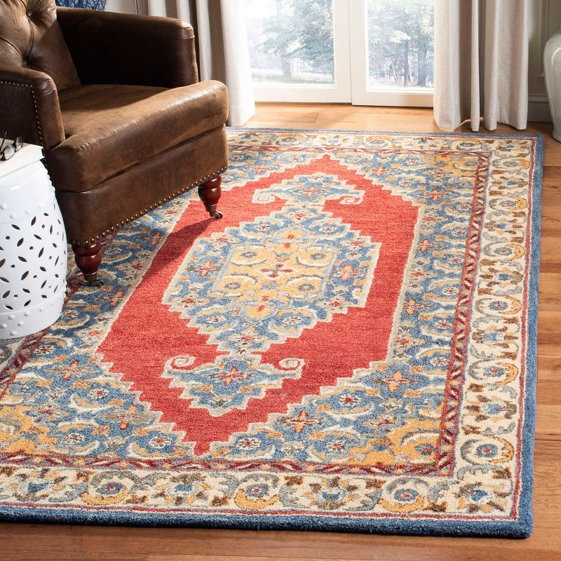 Antiquity AT505 Hand Tufted Area Rug - Blue/Red - 4'x6' - Safavieh.